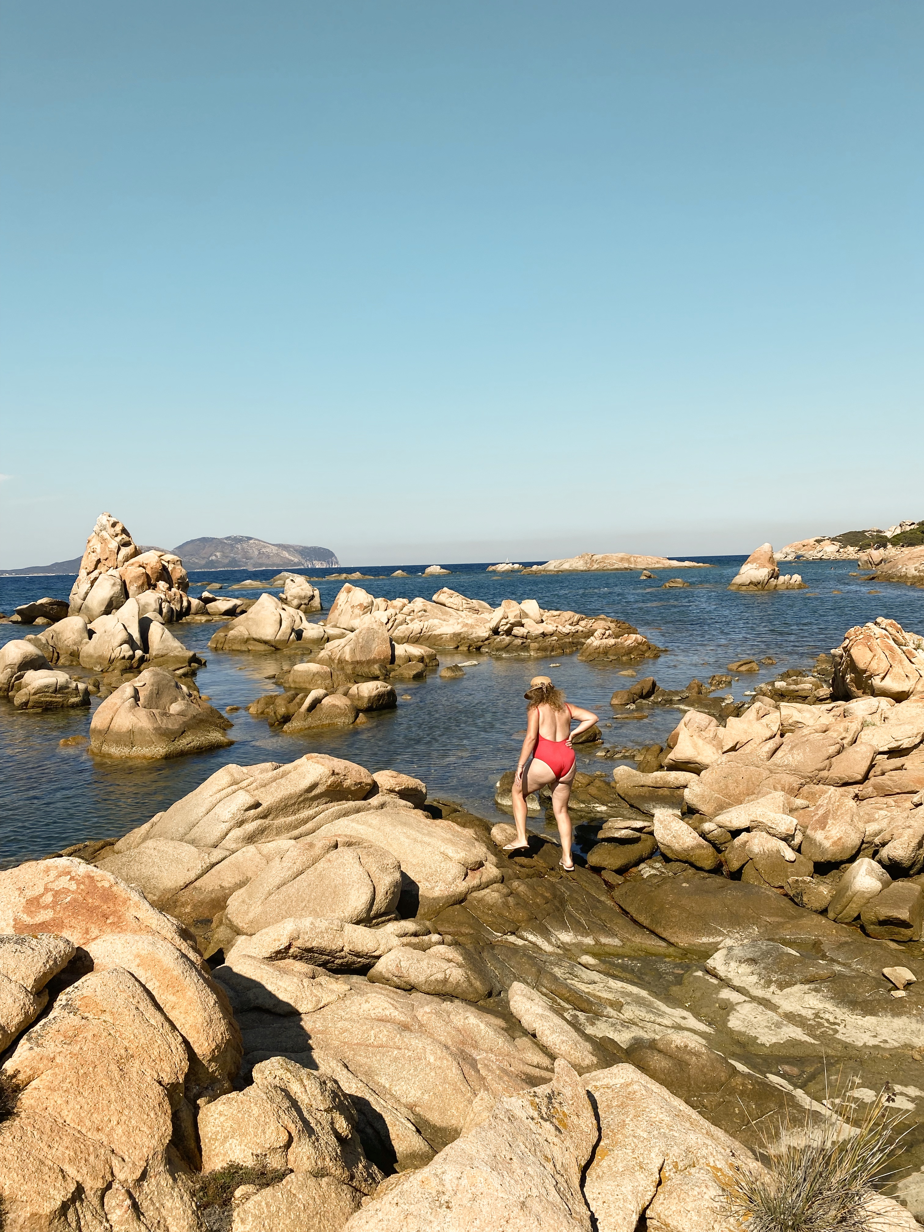 Capo Ceraso coastline with granite rocks and open sea